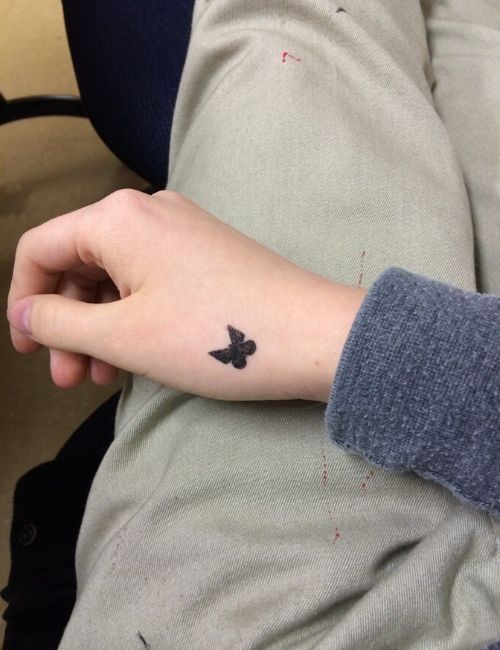 Small Butterfly Tattoo on left wrist