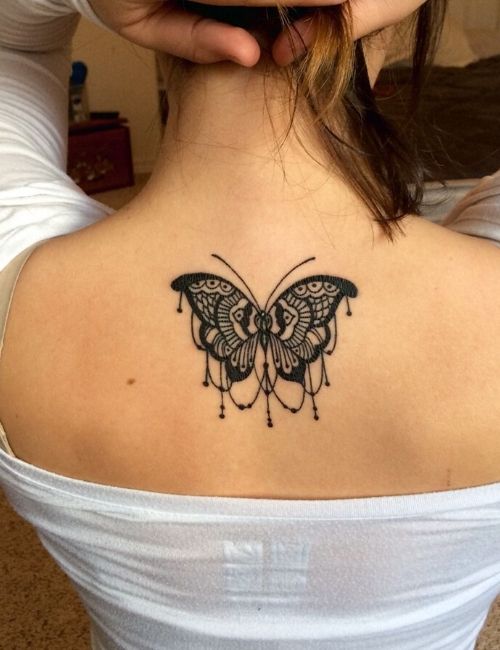 butterfly tattoo on neck