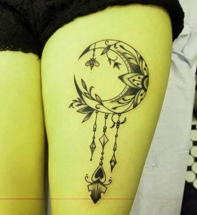 Half-moon-dreamcatcher-tattoo-on thighs